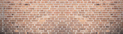 Orange brown weathered dirty brick stone masonry wall texture background wallpaper panorama banner