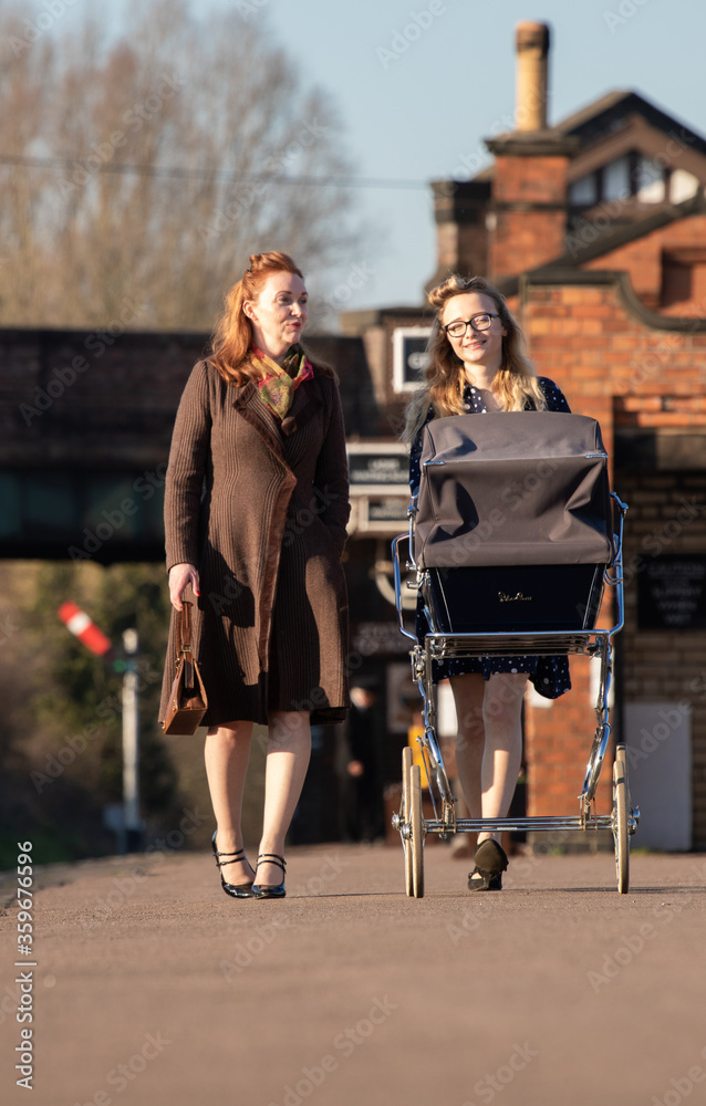 A portrait of a two beautiful ladies during a 1940s themed shoot at Quorn in February 2019.