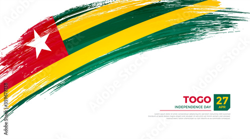 Flag of Togo country. Happy Independence day of Togo background with grunge brush flag illustration