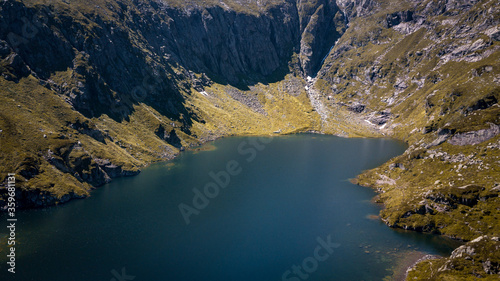 Etang de Gardet  avec un drone  lac dans les montagnes des Pyr  n  es - Ari  ge  Occitanie  - France
