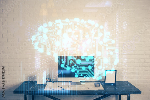 Multi exposure of work space with computer and human brain hologram. Brainstorm concept. © peshkova