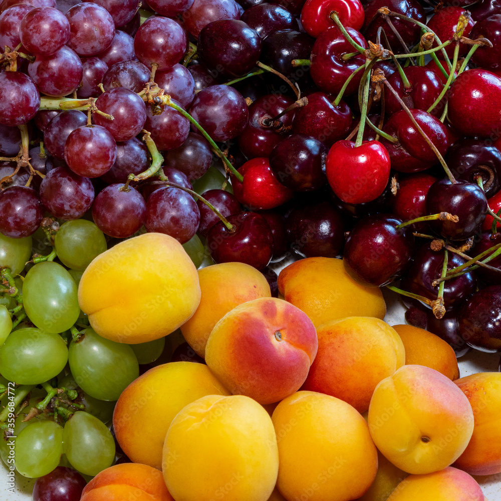 Fruits close up. Bright fruits as a background. Vitamins for a healthy diet Fruits close up. Bright fruits as a background. Vitamins for a healthy diet