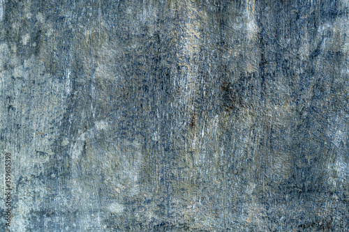 old concrete grunge wall - dark grey with ocre spots and stains