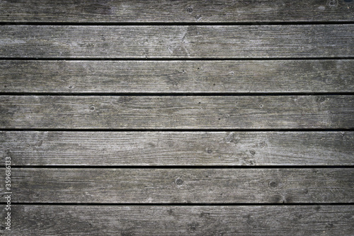 Rustic wood planks background with nice vignette