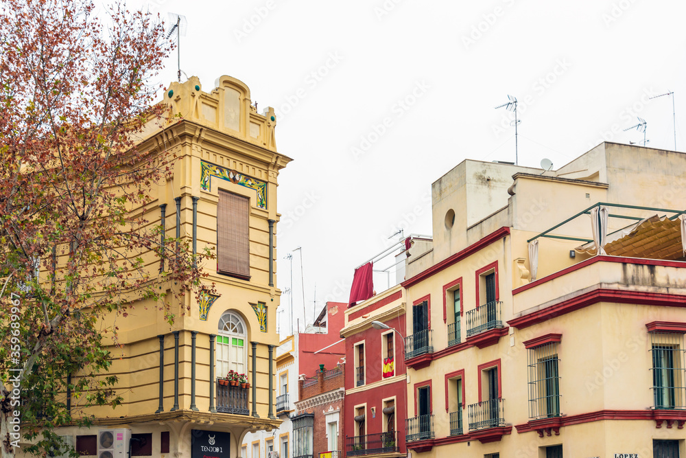 SEVILLA, SPAIN - January 13, 2018: Antique building view in Old Town Seville, Spain