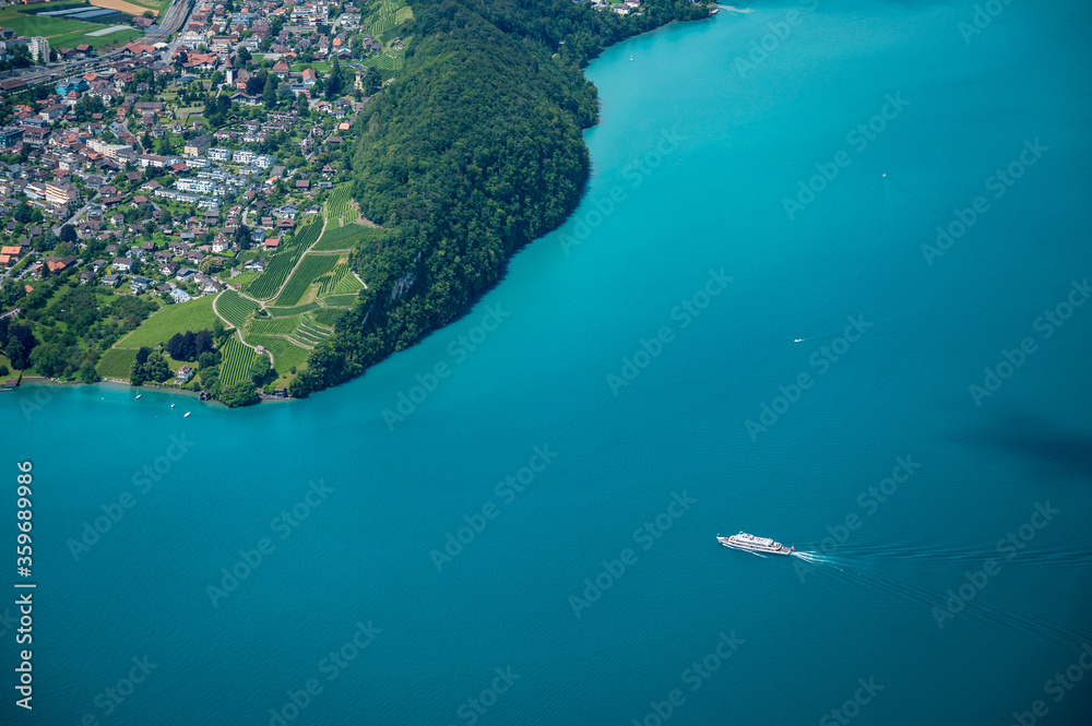 aerial view of the Bay of Spiez, Lake Thun and a course ship