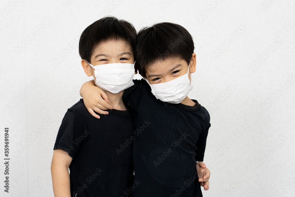 Asian boy waring mask for protect corona virus.