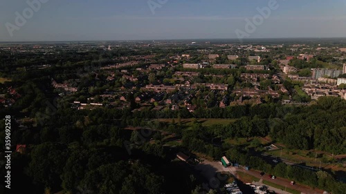 Wide aerial of beautiful city in a green area in the Netherlands photo