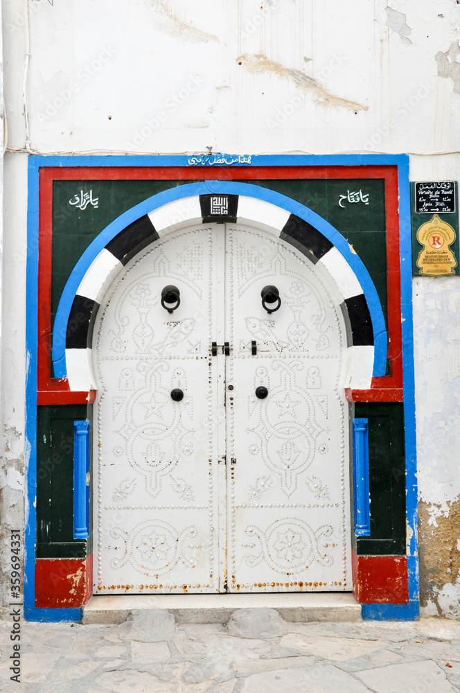Naklejka premium Traditional old painted door in Sidi Bou Said, Tunisia.