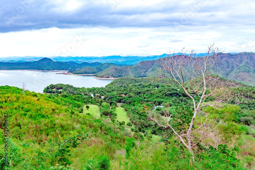 Beautiful scenery views of nature with a large reservoir above the Srinagarind Dam at Rai Ya Yam in Si Sawat District, Kanchanaburi Thailand.