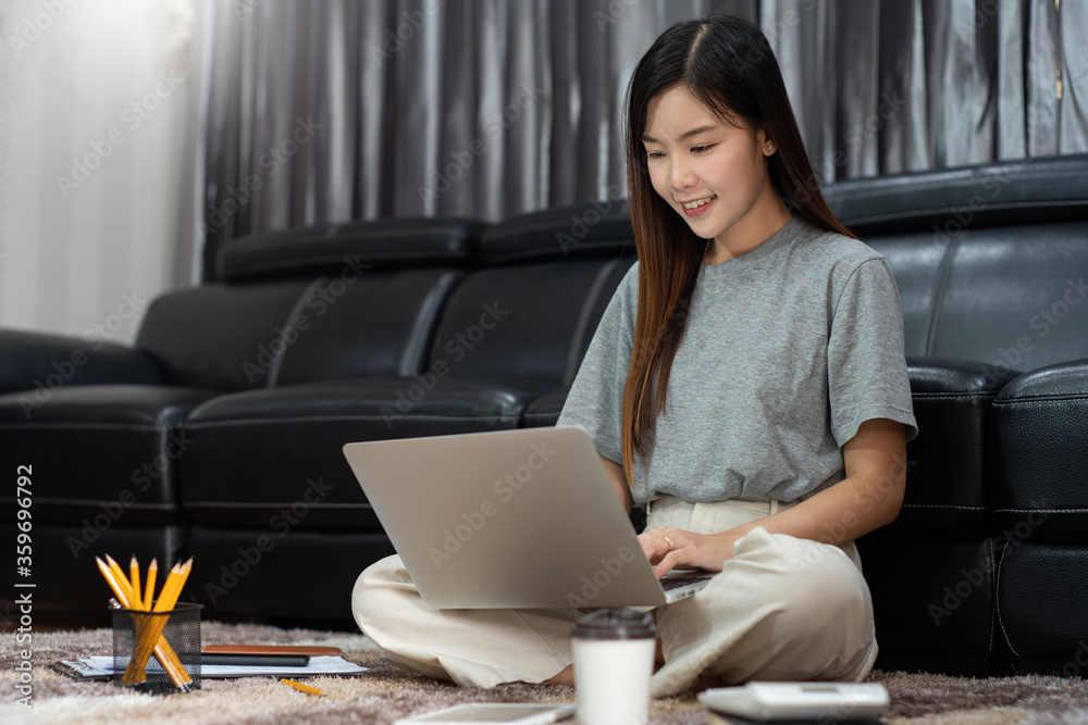 Naklejka premium asian woman working with laptop and document work from home concept