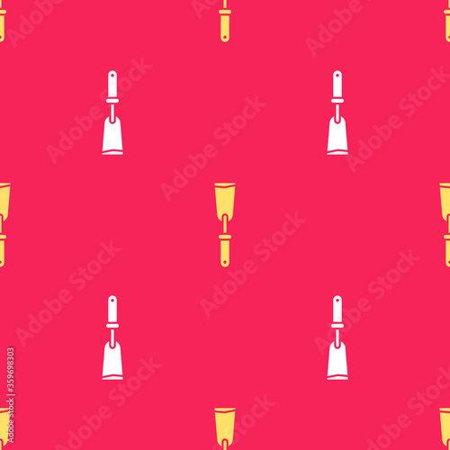 Yellow Putty knife icon isolated seamless pattern on red background. Spatula repair tool. Spackling or paint instruments. Vector Illustration.