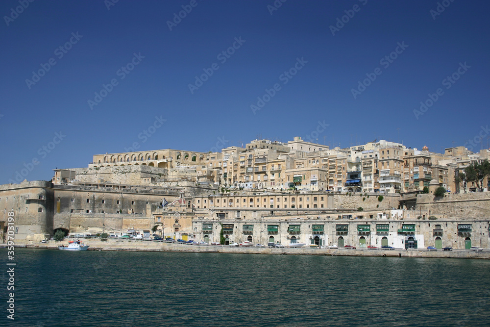 Old house and fort of Valetta from the Bay Old house and fort of Valetta from the Bay