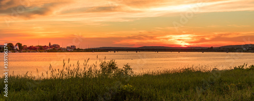 Sunset over St. John River Fredericton New Brunswick. Taken June 22, 2020  photo