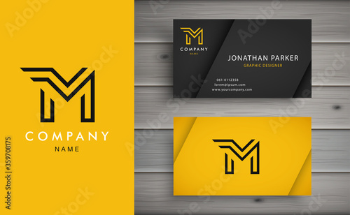 Clean and stylish logo forming the letter M with business card templates. Modern Logotype design for corporate branding.