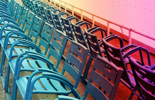 Blue chairs on the Promenade des Anglais in Nice, France. 