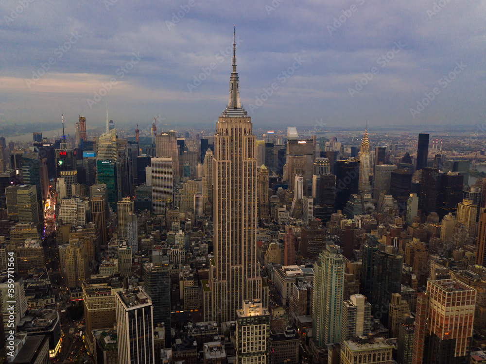 The Heart of Manhattan, Empire State Building in New York City Aerial Drone View on Rainy Cloudy Day