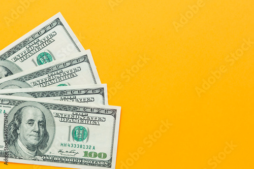 Money. american money on yellow background photo