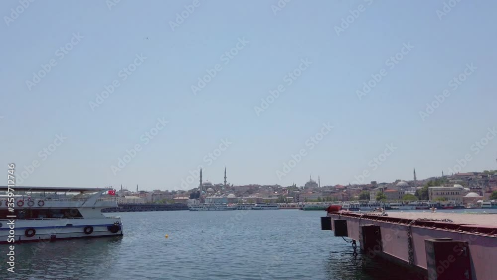 Touristic boats in Golden Horn bay of Istanbul and view on Suleymaniye mosque. Touristic boats in Golden Horn bay of Istanbul and view on Suleymaniye mosque.