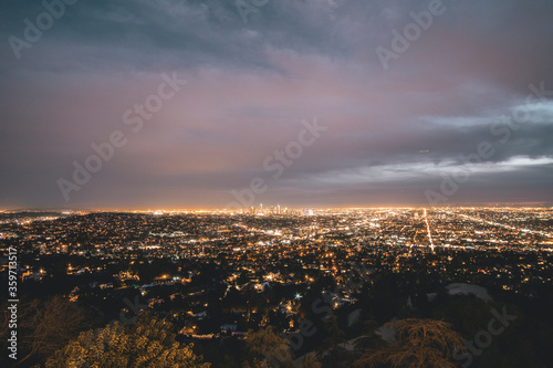 Beautiful Wide View over all of Los Angeles at Night with City Lights glowing in the distance