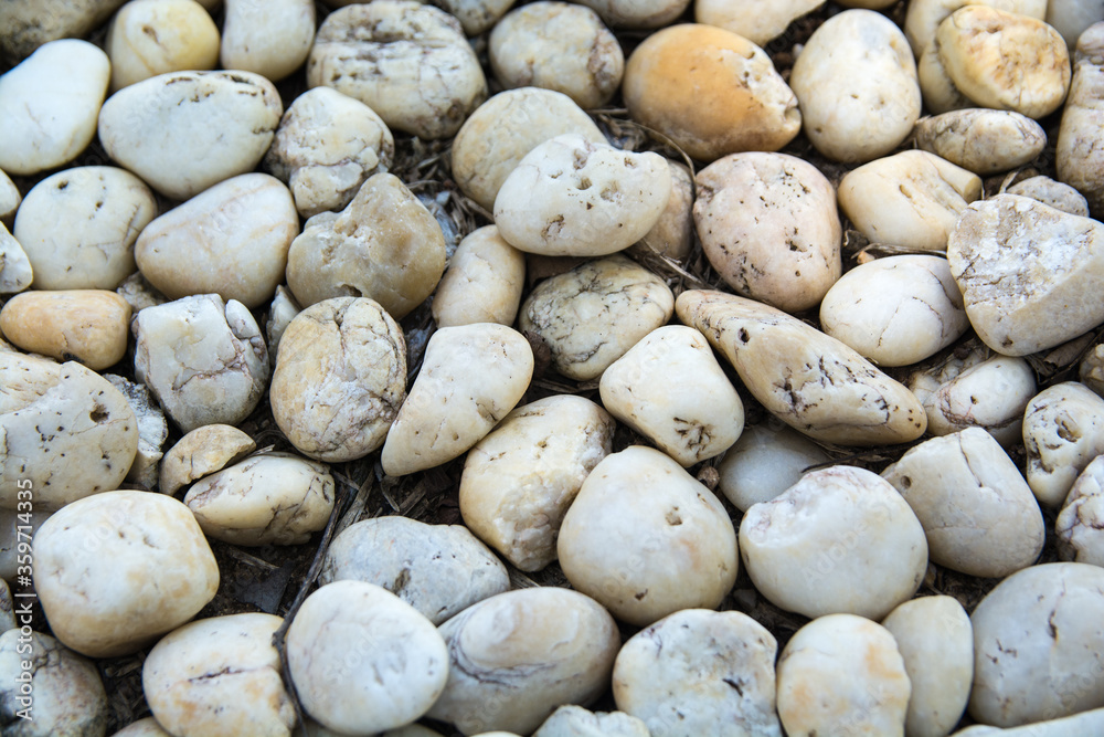 various size marble rocks on the ground texture