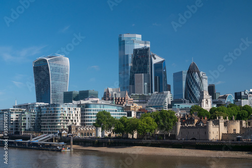 City of London financial district seen from Tower Bridge New office towers glint in the morning sunshine. © John Photography