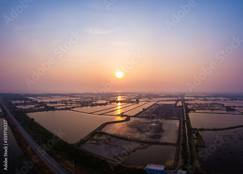 Sunset over field with beautiful aerial landscape