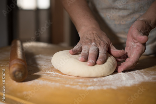 hands on dough preparations on pastry 