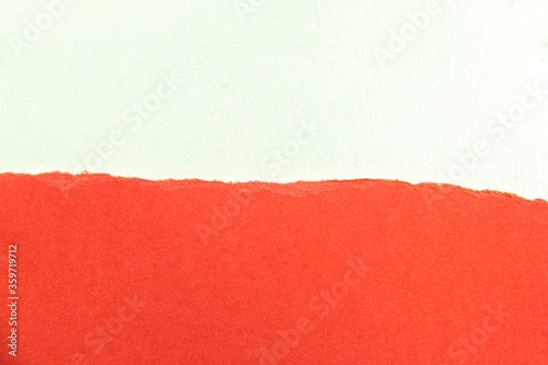 Divide the half of the red torn paper sheet