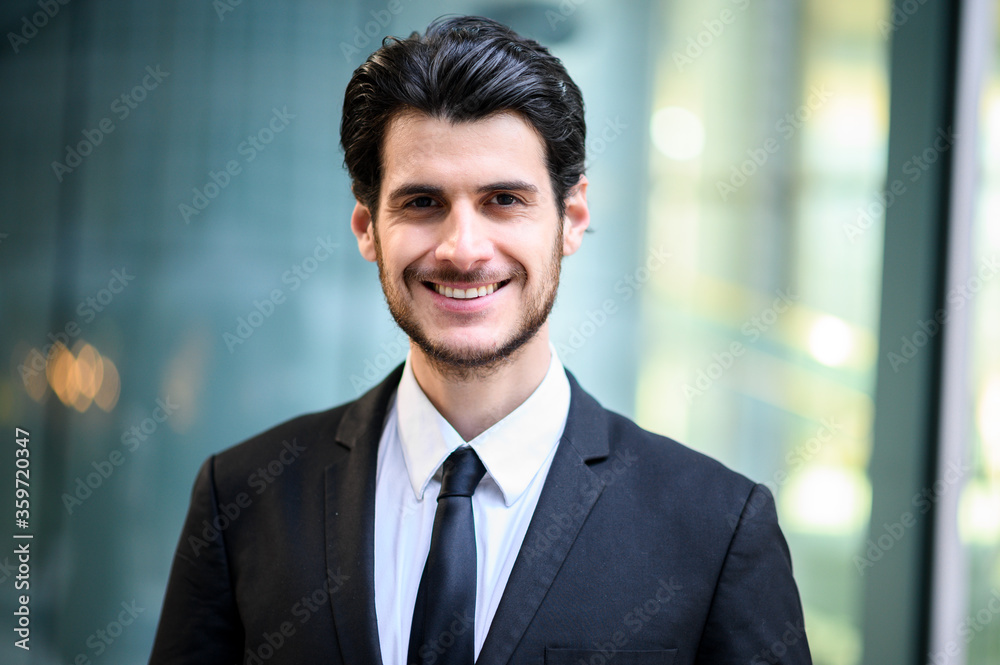 Young businessman outdoor smiling confidently Young businessman outdoor smiling confidently