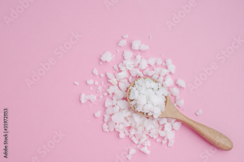 Sea salt in a wooden spoon ...