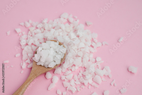 Sea salt in a wooden spoon ...