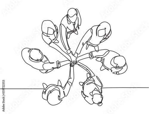 One single line drawing group of young happy business people unite their hands together to form a circle shape symbol, top view. Trendy teamwork concept continuous line draw design vector illustration photo