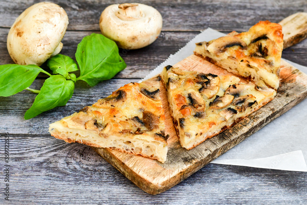  Mushroom italian  roman  style pizza.   Parmesan cheese,  cream, olives , , garlic, mushrooms,  tomato sauce 