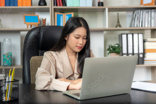 beautiful young woman working in the office.