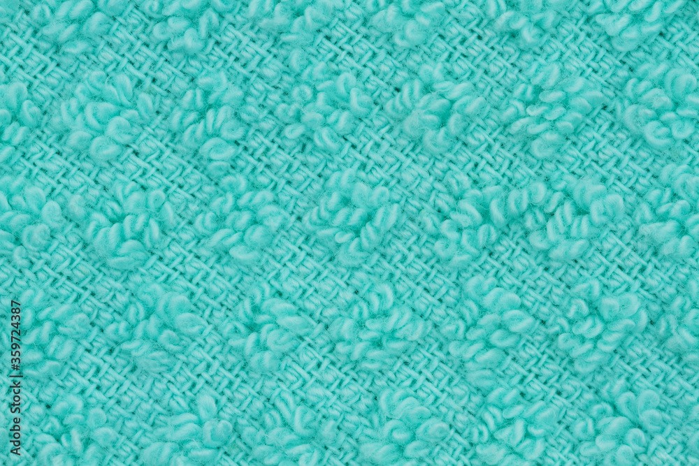 Obraz premium Teal knit textured weave material background