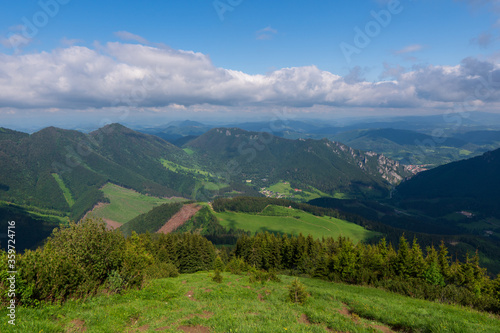 Mountain green valley village landscape. Mountain valley town panorama © Martin