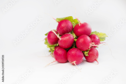 bunch of radishes on a white background