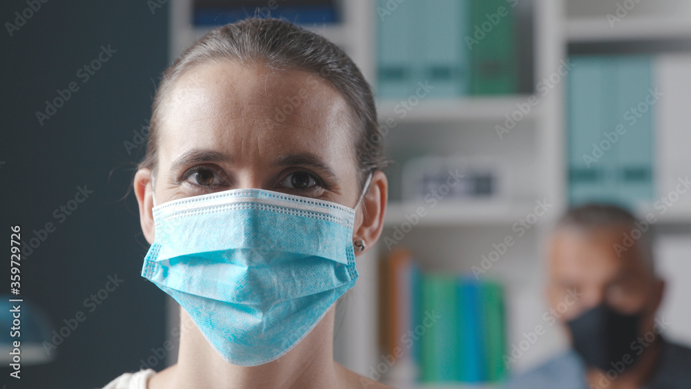 Businesswoman wearing a face mask Businesswoman wearing a face mask