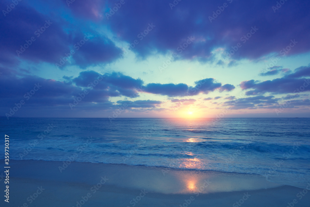 Seascape, sunset over the sea. Atlantic ocean in the evening. Beautiful nature