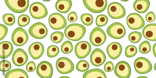 seamless pattern with halves of avocado on a white background. flat design. healthy eating. concept for natural cosmetics