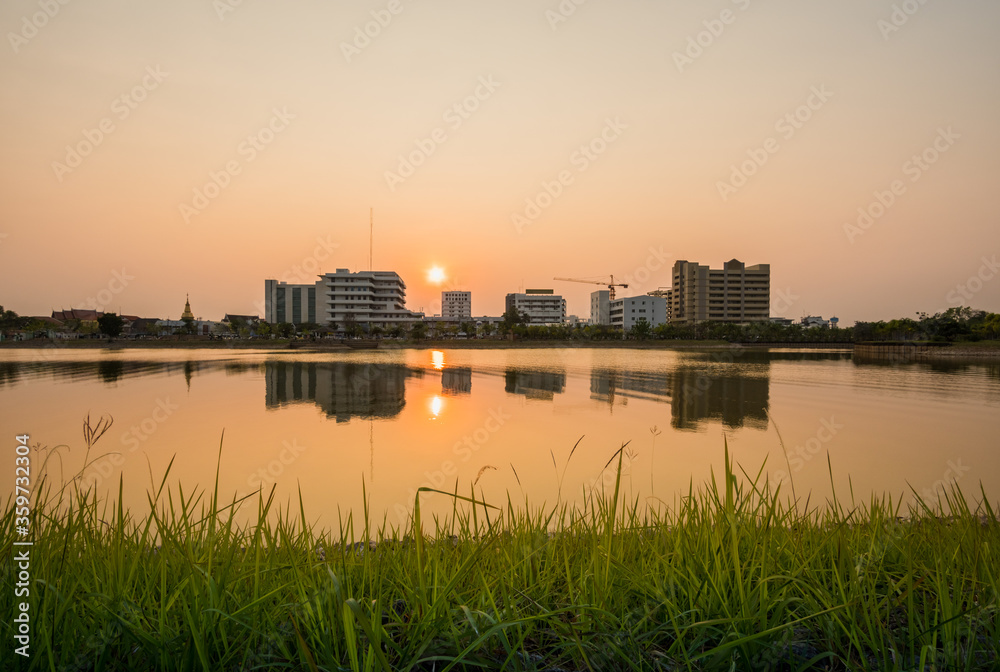 Fototapeta premium Sunset with lake in Public Park landscape