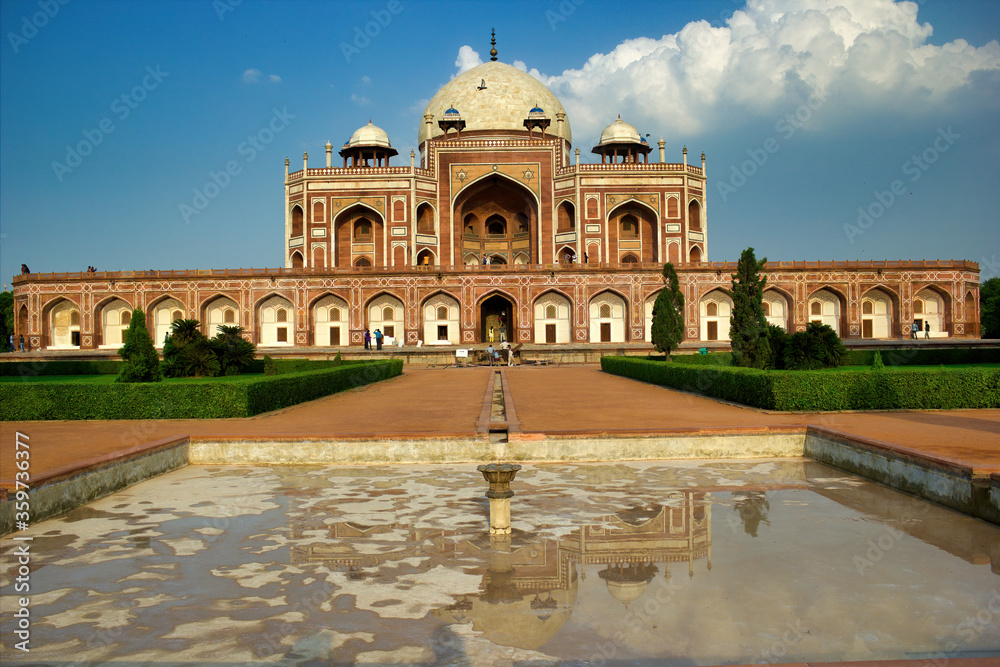 Artistic perspective of Humayun tomb architecture against a blue sky located in New Delhi, India