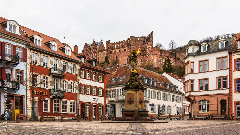 Fototapeta premium Cornmarket, ger. Kornmarkt and Statuesque of Kornmarktmadonna in Downtown of City Heidelberg, Baden-Wuerttemberg, Germany. Europe
