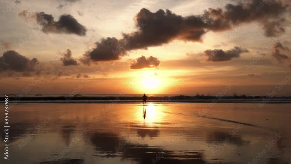 Silhouette of Man Running on The Beach During Sunset in Slow Motion Silhouette of Man Running on The Beach During Sunset in Slow Motion
