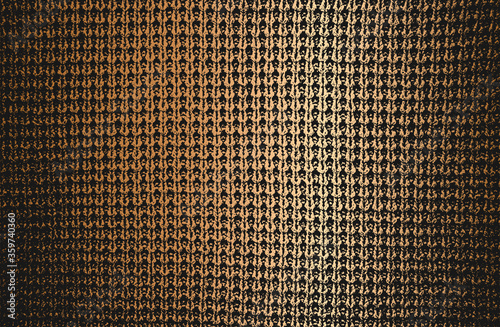 Distressed overlay texture of golden weaving fabric, ornamental knitted sweater, plait, jersey, pullover. grunge background.