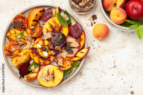 Grilled salad with summer fruits.