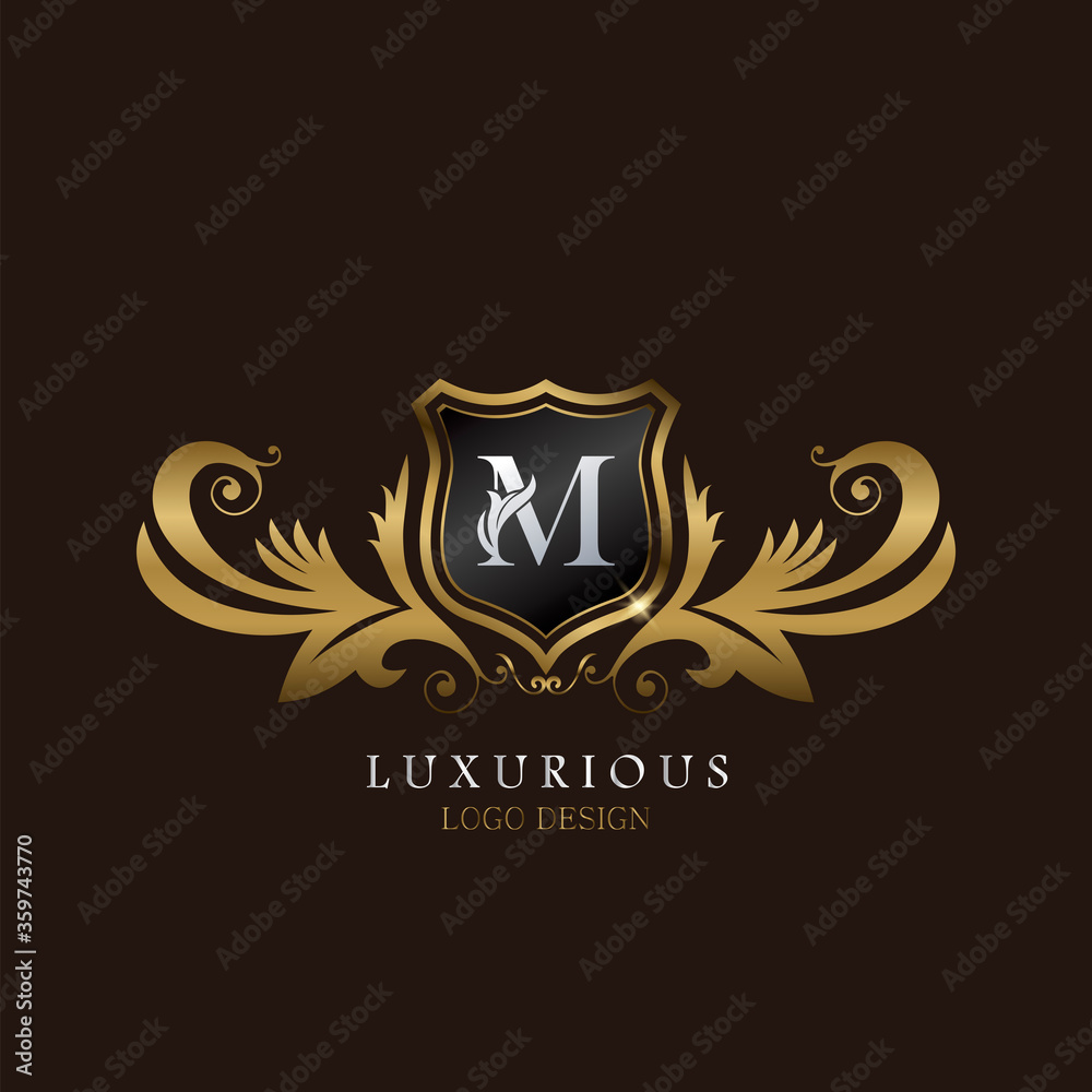 Golden M Logo Luxurious Shield, creative vector design concept for luxury brand identity.