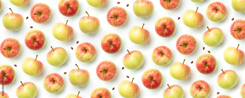 Fresh red apples isolated on white background. Fruits pattern, top view, flat lay, wide composition Fresh red apples isolated on white background. Fruits pattern, top view, flat lay, wide composition