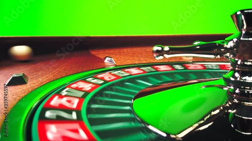 Roulette table close up at the Casino over green screen  - Selective Focus